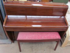 A Challen mahogany upright piano,