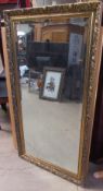 Three gilt framed wall mirrors