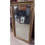 Three gilt framed wall mirrors