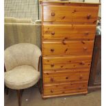 A modern pine chest of drawers together with an Edwardian tub chair