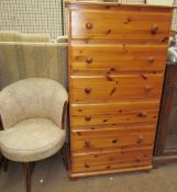 A modern pine chest of drawers together with an Edwardian tub chair