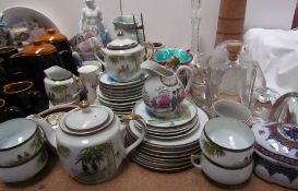 A large lot including a Japanese part tea set together with a glass decanter, glass vases,