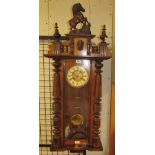 A walnut cased Vienna regulator type wall clock,