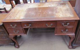 A 20th century mahogany desk,