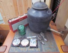 A 3 gallon cast iron kettle with brass tap together with a dumpy weight, compacts,