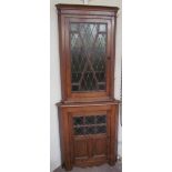 A 19th century oak standing corner cupboard,