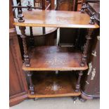 A Victorian walnut three tier whatnot,