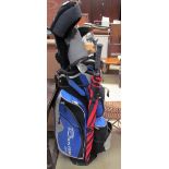 A Bencross golf bag together with assorted clubs etc