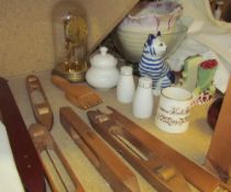Assorted loom shuttles together with an anniversary clock, glass bowl,