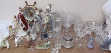 Assorted Lladro and Nao figures together with a Royal Worcester figure of the Queen,