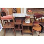 An Edwardian mahogany two tier table together with a two tier trolley, three occasional tables,
