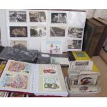 Two John Lennon Estate postcards together with a large postcard album, other postcard albums,