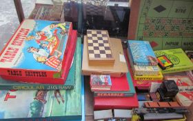 A collection of board games, including Table Skittles, Table Tennis, Totopoly, Go, Scrabble,