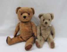 An early 20th century mohair teddy bear and another