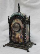 A 19th century French enamel and white metal mounted mantle clock,