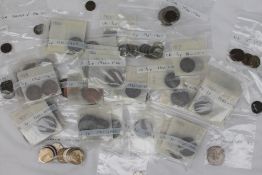 A collection of coins including pennies, 1/2d, 6d,