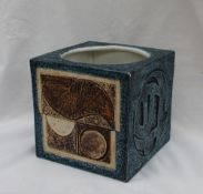 A large square Troika vase, decorated with geometric panels to blues and creams, painted marks,