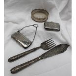 A silver purse of rectangular form with line decoration,