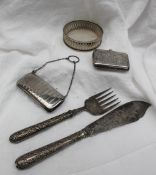 A silver purse of rectangular form with line decoration,