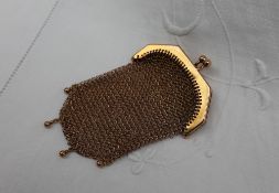 A French yellow metal purse, with a crossover clip and mesh beaded body, approximately 25.