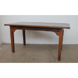A 19th century elm refectory table, the planked cleated top on square tapering legs, 150.