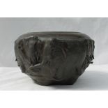 A bronze jardiniere cast with a herd of elephants on a naturalistic base, signed to the underside,