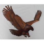A 20th century leather wall mount of an eagle,