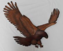 A 20th century leather wall mount of an eagle,