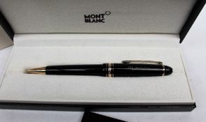 A Montblanc Meisterstuck ballpoint pen, in black, the presentation case printed FIFA,