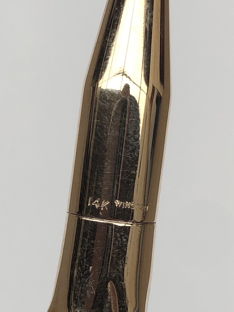 Harry Winston - A 14K yellow gold ball point pen of stylised bamboo design, 13cm long, - Image 3 of 3