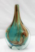 A Mdina axe head glass vase with scrolling browns and greens,