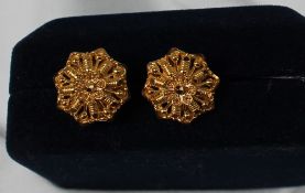 A pair of Indian 22ct gold earrings,