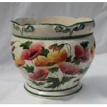 A Llanelly pottery jardiniere, with a shaped rim, painted with poppies and leaves, 19.