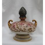 A late Victorian silver mounted pottery twin handled oil lamp,