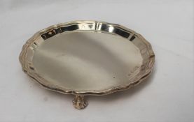 A George VI silver salver with a shaped edge on scrolling leaf feet, Sheffield, 1951, Viners Ltd,