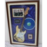 A Beatles style Stratocaster signed by Paul McCartney, George Harrison and Ringo Starr,