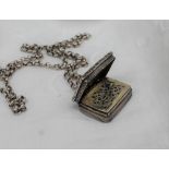 A George IV silver vinaigrette of rectangular form with a raised edge and initialled cartouche,