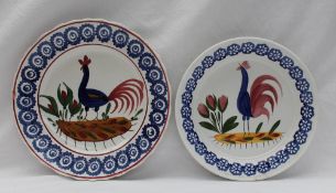 A Llanelly pottery plate, painted with a blue cockerel,