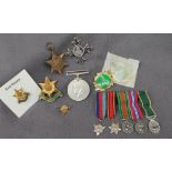 A set of five World War II minature medals together with The War Medal, The Burma Star, OBE,