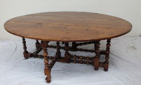 An 18th century style oak wake table,