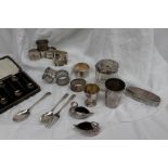 A George V silver christening spoon and fork, London, 1926, together with silver napkin rings,