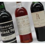 A bottle of Grand Vin de Chateau Latour 1965 together with a Fonseca's Finest 1970 Vintage Port and