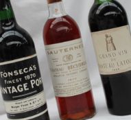 A bottle of Grand Vin de Chateau Latour 1965 together with a Fonseca's Finest 1970 Vintage Port and