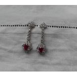 A pair of ruby and diamond drop earrings,