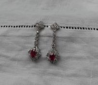 A pair of ruby and diamond drop earrings,