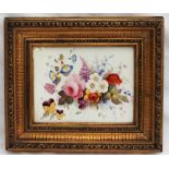 A 19th century English porcelain plaque, painted with a spray of Garden flowers,