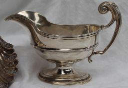A silver sauce boat,