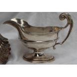 A silver sauce boat,