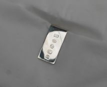 An Elizabeth II silver money clip, of rectangular form, Birmingham, 2010,