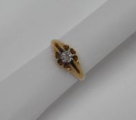 An 18ct yellow gold signet ring set with an old round cut diamond, approximately 0.